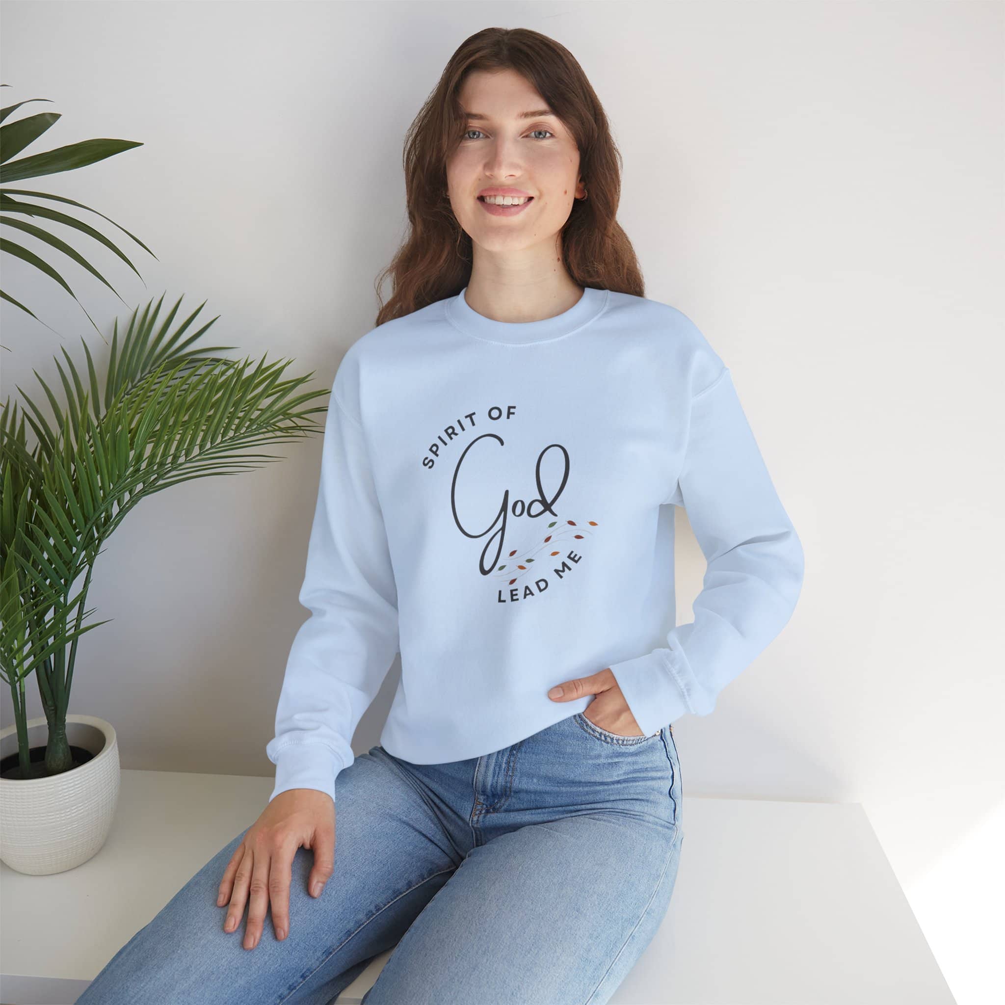 Logos Christian women's sweatshirt in light blue with Spirit of God lead me design