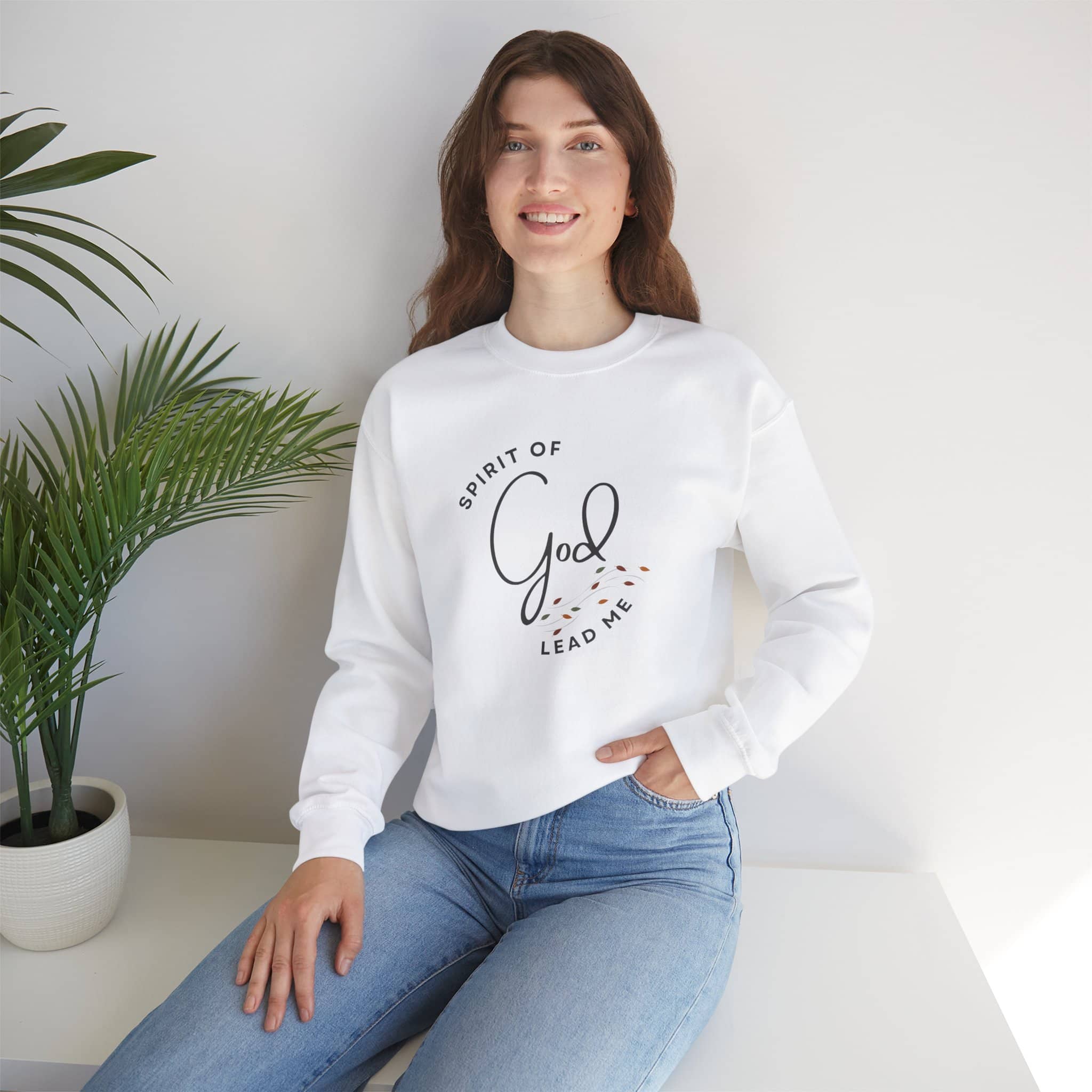 Logos Christian women's sweatshirt white with 'Spirit of God Lead Me' design worn by woman