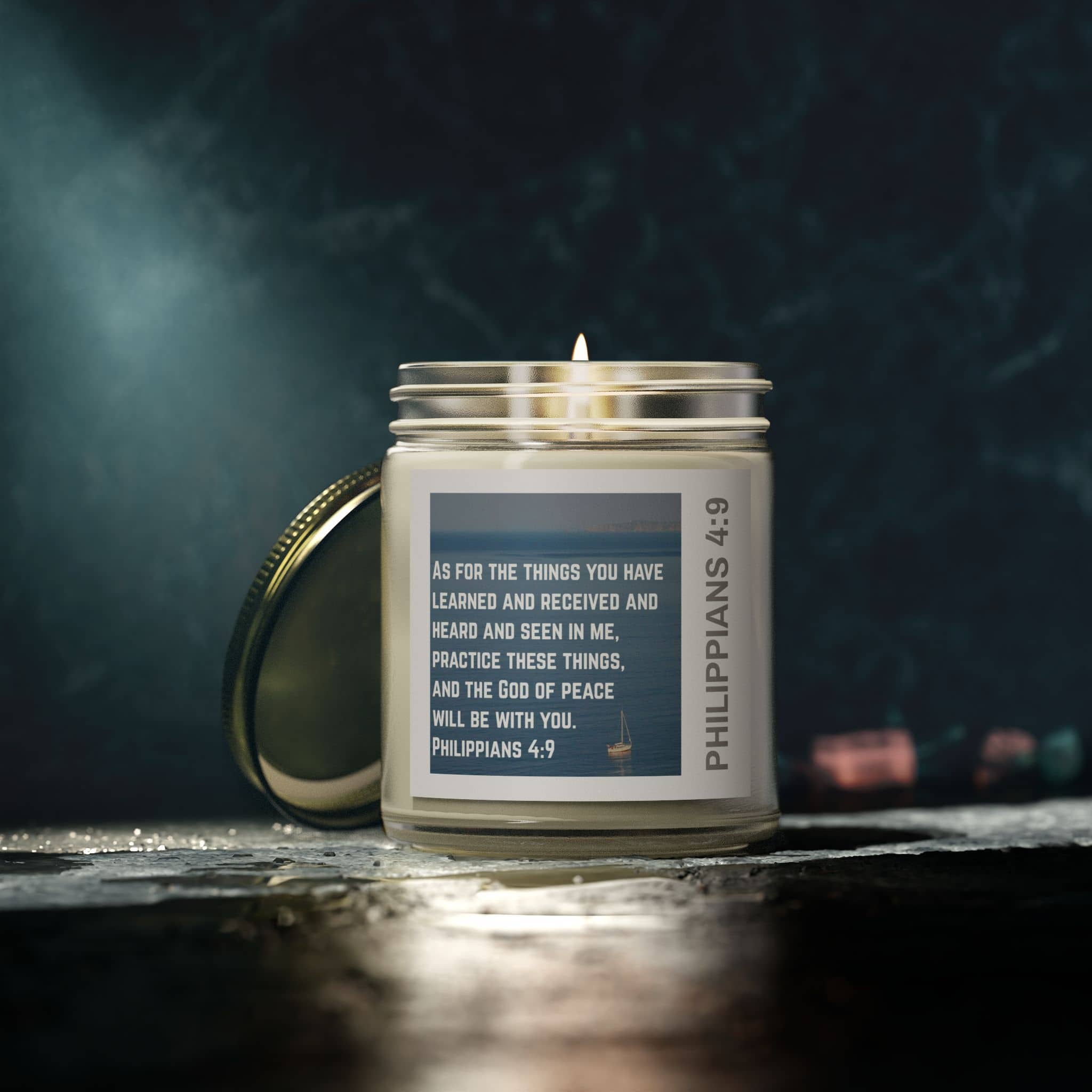 Eco-friendly Christian candle by Logos with Philippians 4:9 scripture on glass jar and lid
