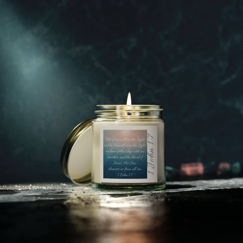 Eco-friendly scripture candle in a glass jar with a soothing flame and inspirational verse