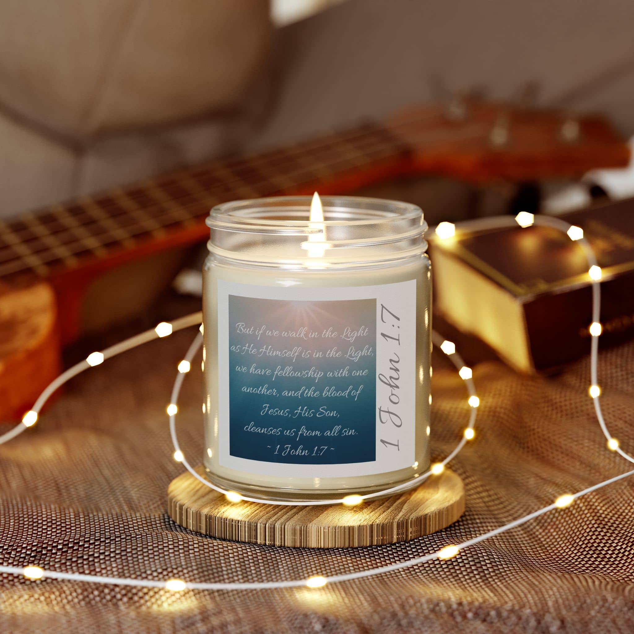 1 John 1:7 Scripture verse on a beautiful blue background printed on an Eco-friendly wax candle in a clear glass jar