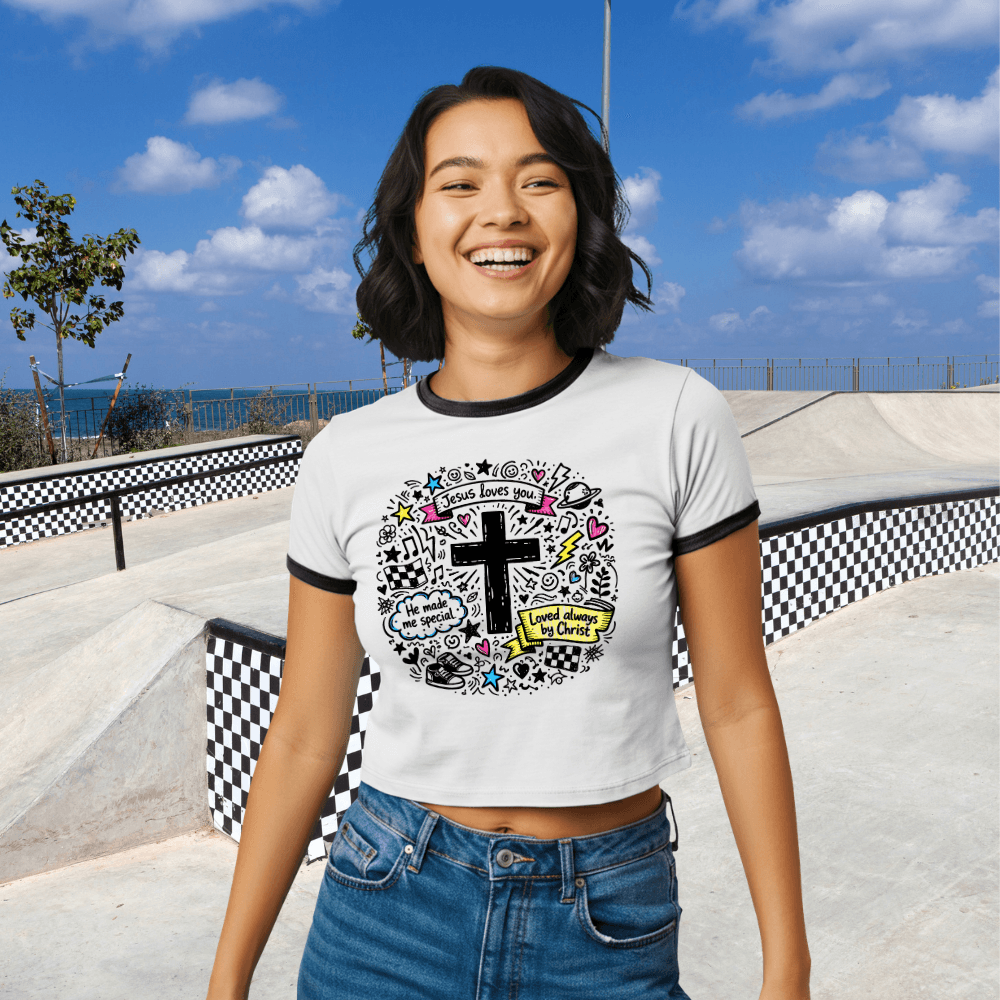 White Fearfully & Wonderfully Made Ringer Tee with colorful design featuring a cross, front view