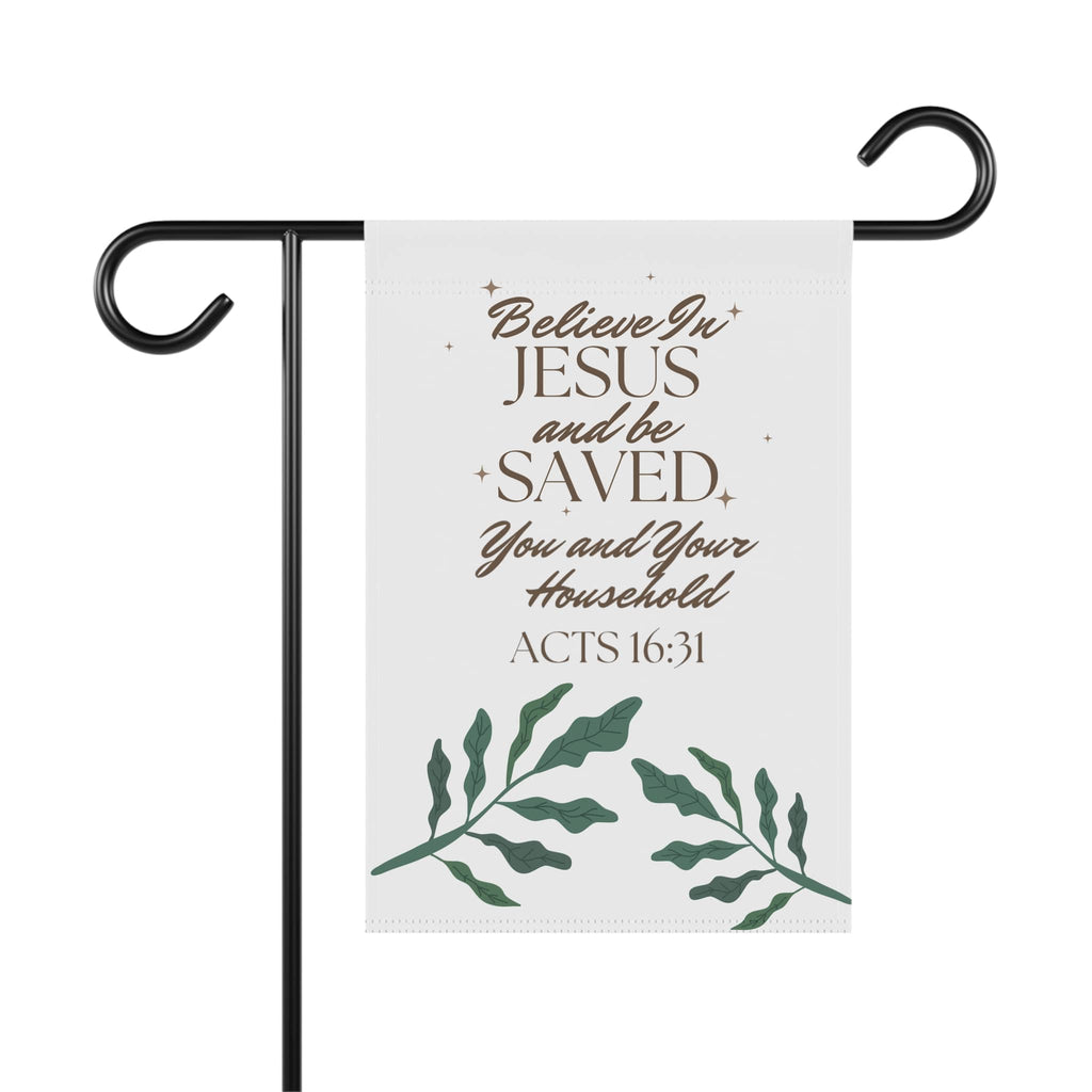 Christian garden banner with Believe in Jesus and be Saved quote and green leaf design hanging on black metal stand