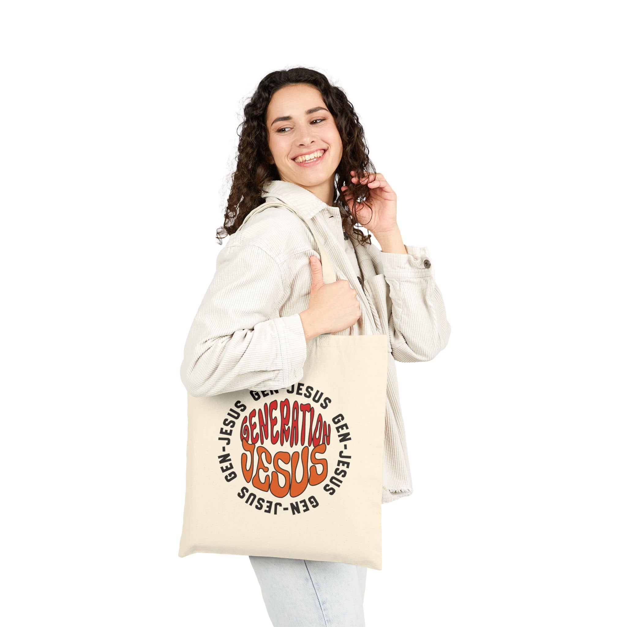 Generation Jesus Canvas Tote Bag featuring a bold design in cream color, held from the side