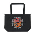 Generation Jesus Canvas Tote Bag in black with colorful circular logo design on the front