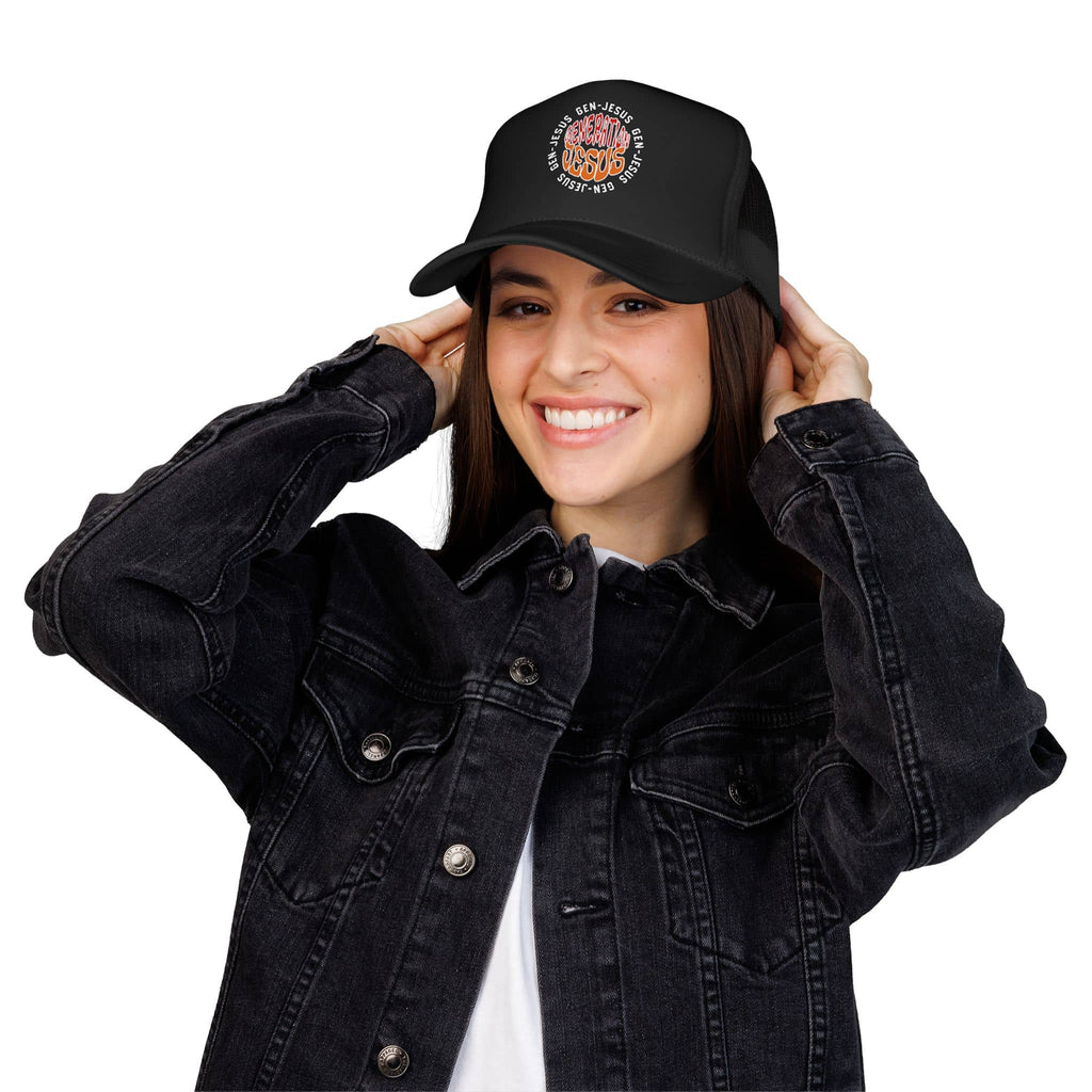 Generation Jesus Trucker Hat Red Orange with embroidered logo, shown on a model wearing a black denim jacket