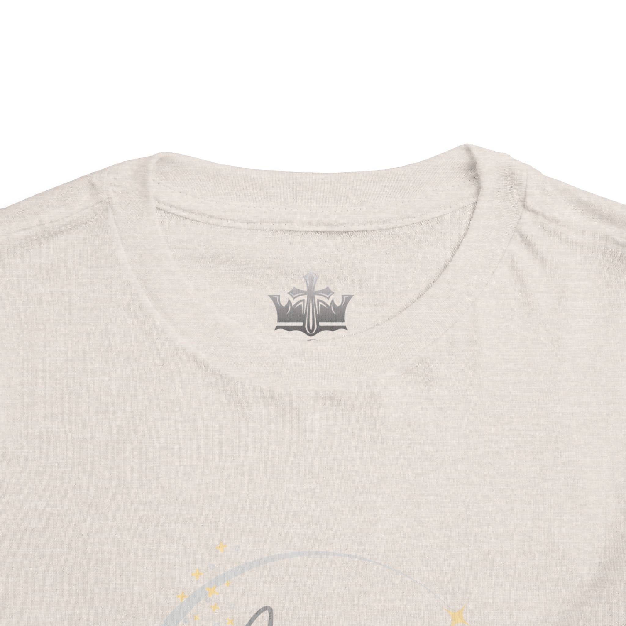 Close-up of a beige girls scripture tee collar from Logos made of soft cotton fabric