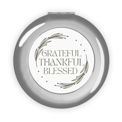 Silver compact mirror featuring Grateful Thankful Blessed design with elegant floral accents