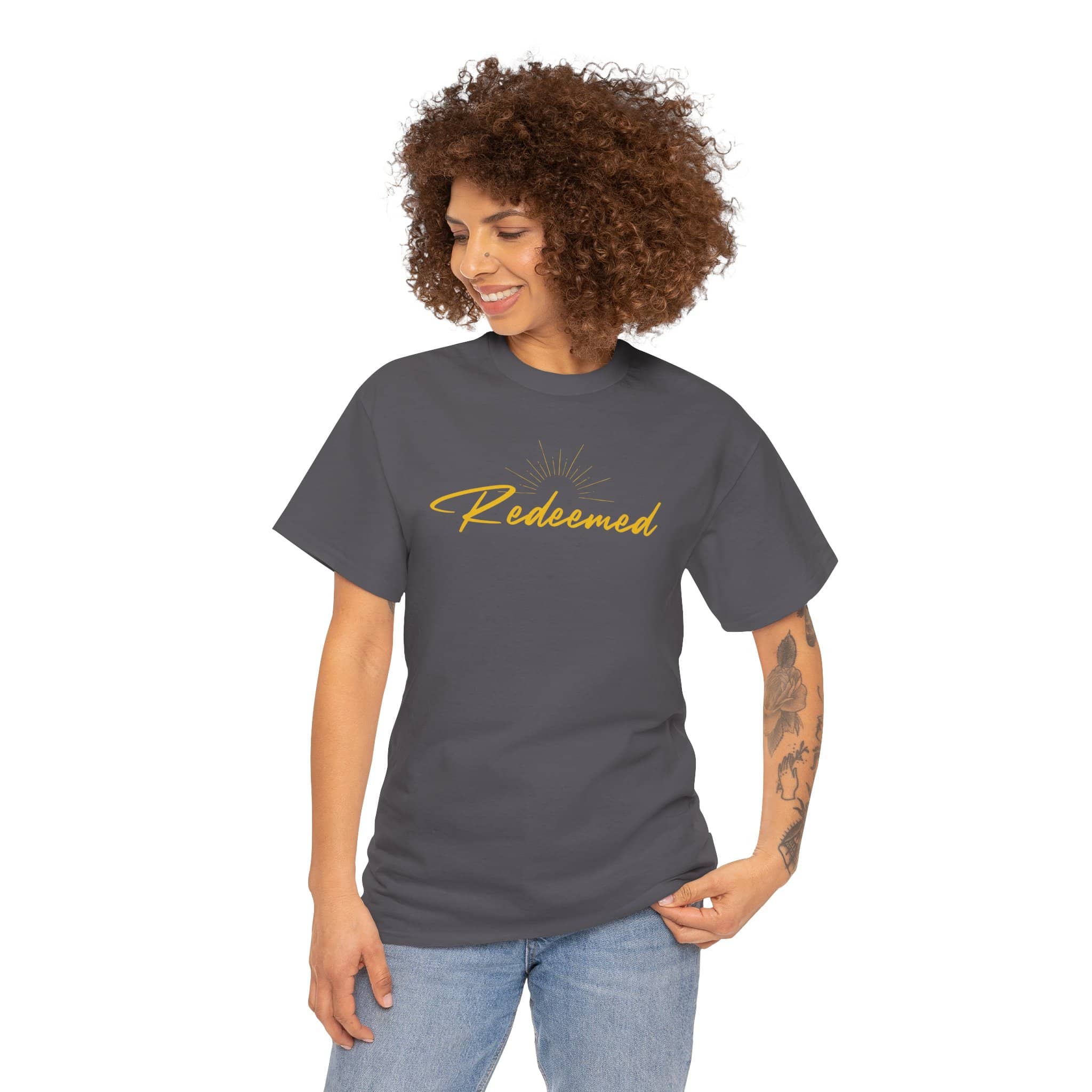 Ephesians 1:7 inspirational shirt featuring 'Redeemed' text in vibrant yellow