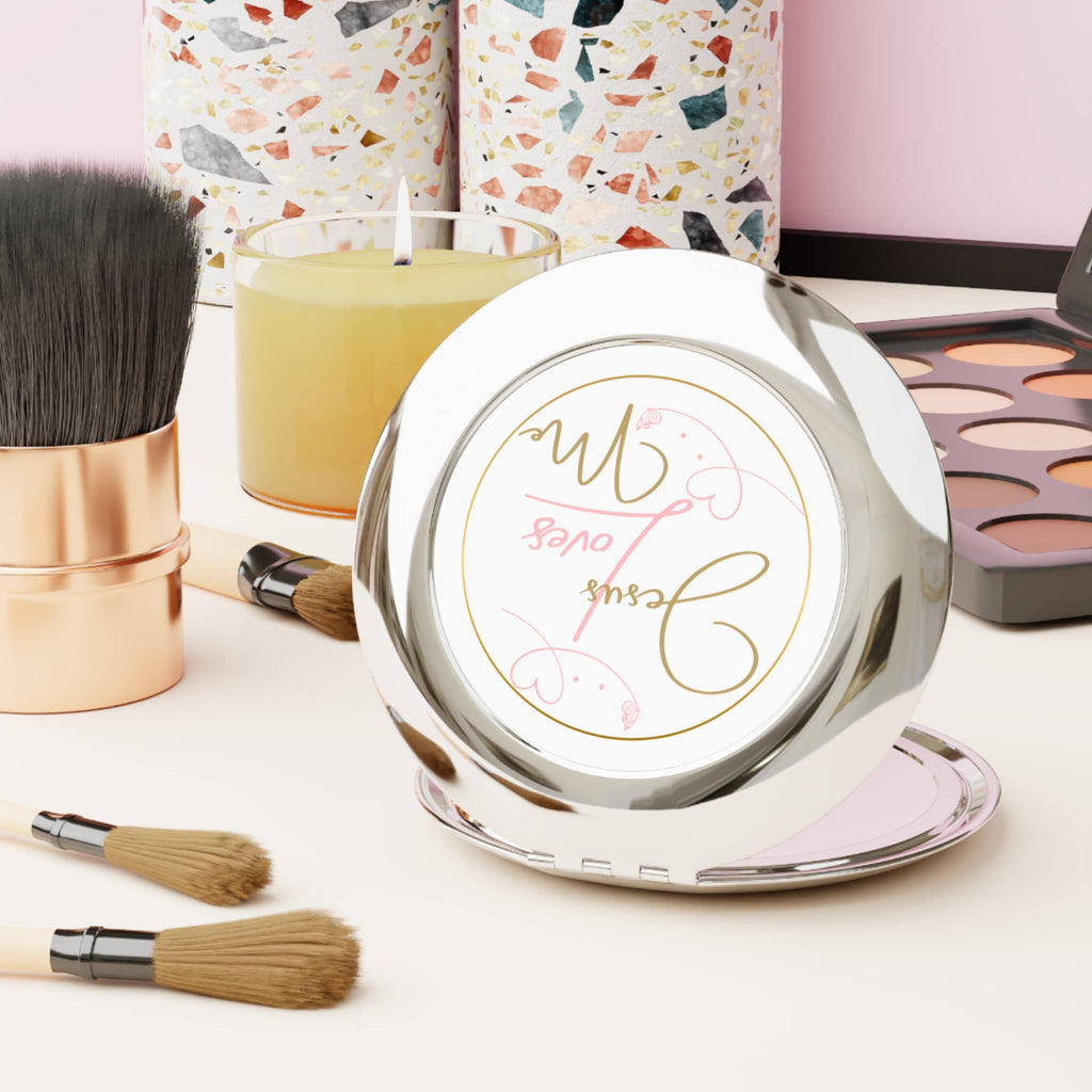 Jesus Loves Me compact mirror with a shiny silver finish, perfect for makeup touch-ups on-the-go