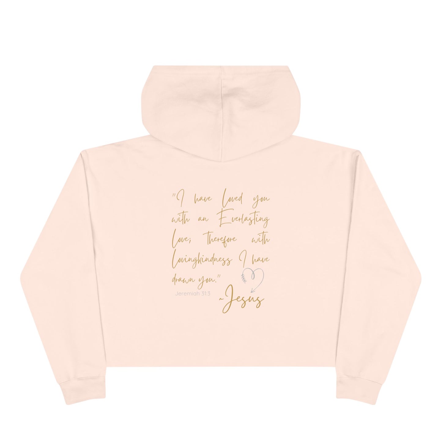Back view of a light pink Jesus Loves Me crop hoodie with a gold inspirational Bible quote and heart design