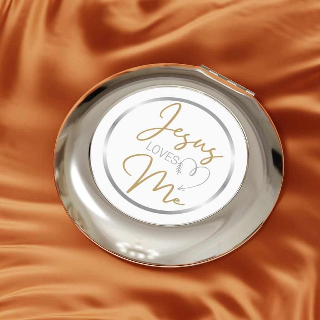 Stylish round mirror featuring the text Jesus Loves Me in gold on a white background