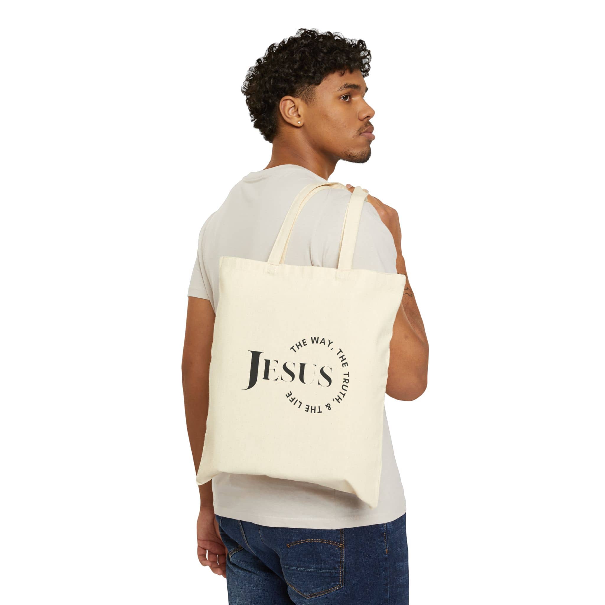 Tote bag featuring 'Jesus The Way, The Truth, The Life' in black on natural canvas, back view
