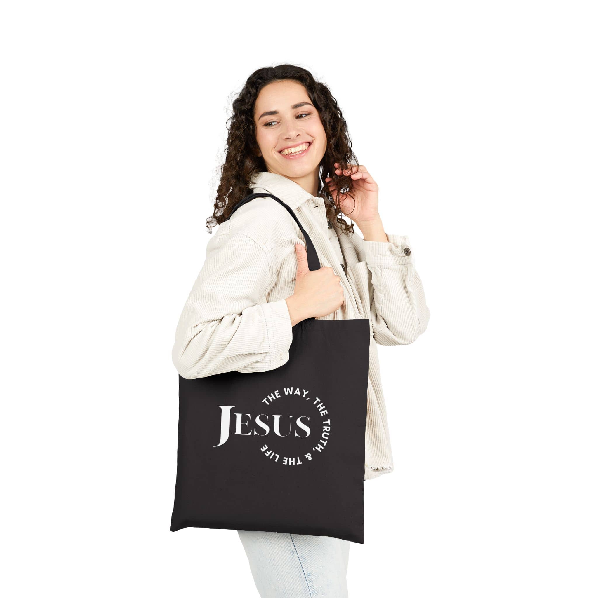 Black tote bag featuring the phrase Jesus The Way, The Truth, The Life on the front