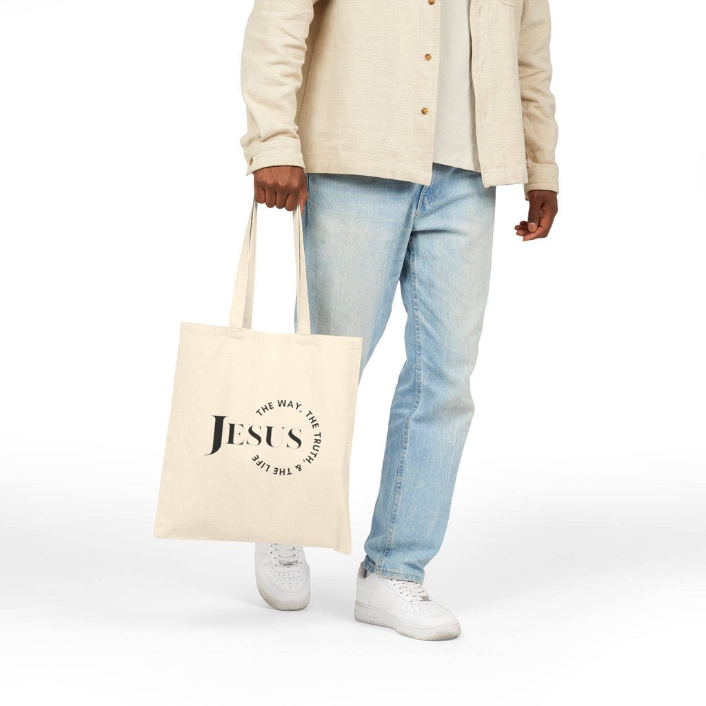Canvas Jesus The Way, The Truth, The Life Tote in natural color, front view on model with casual outfit