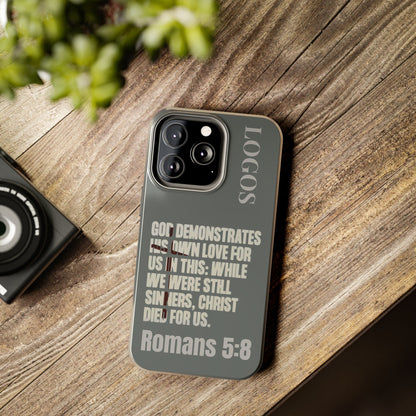 Christian phone case with Romans 5:8 scripture design on gray background for Logos