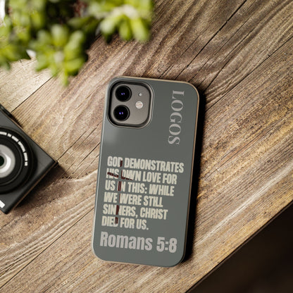 Logos Christian phone case with Romans 5:8 Bible verse quote in gray and beige text