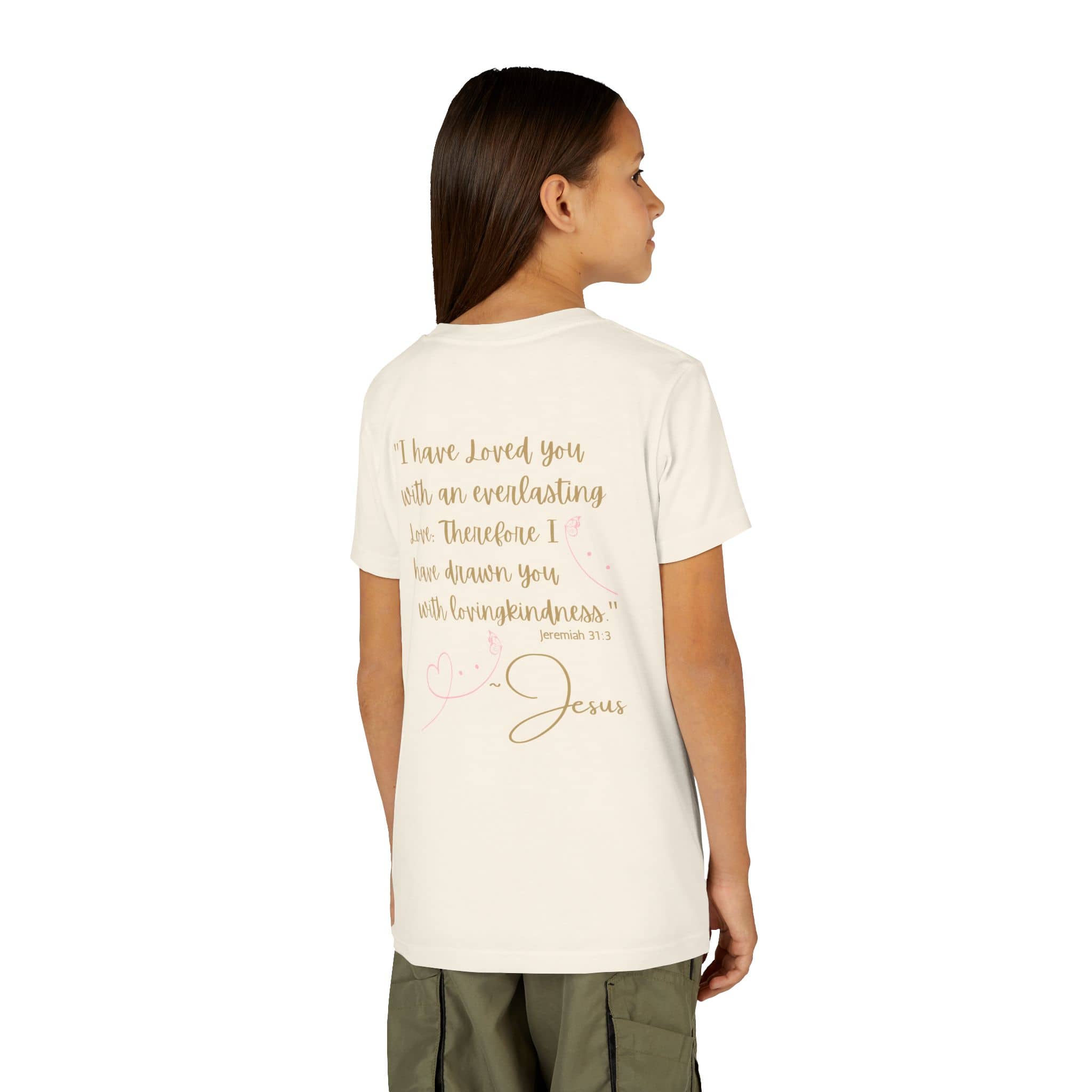 Jesus Loves Me youth shirt in cream color featuring a faith-inspired message on the back