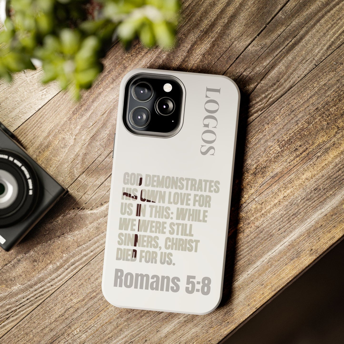 Logos Co. faith-based tough cases with Romans 5:8 scripture design on protective phone case