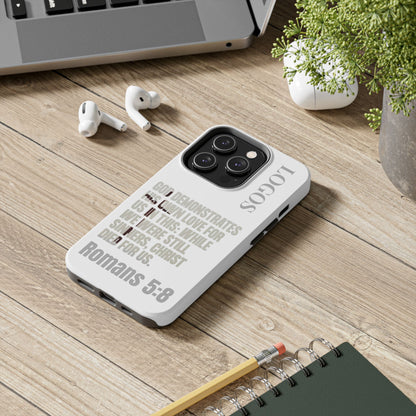Logos Co. faith-based tough cases phone case with Romans 5:8 scripture design on wooden desk