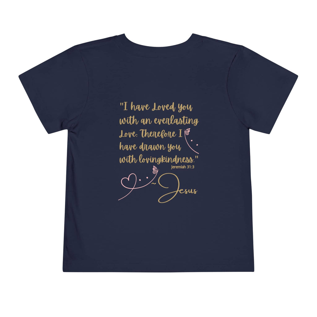 Navy kids shirt from Logos Co. with Jesus Loves Me shirt Bible verse design in gold script