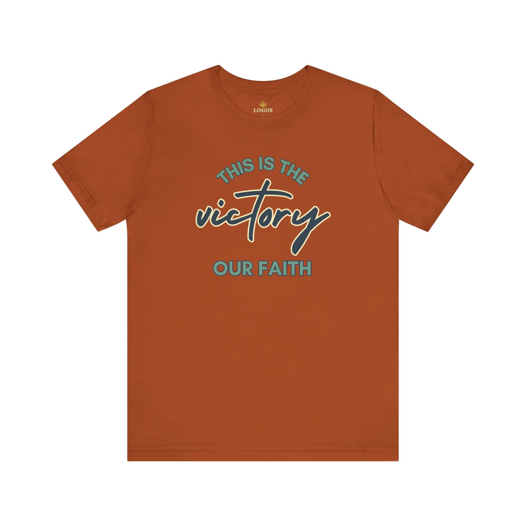 Logos This Is The Victory T-shirt in burnt orange color with faith-themed text design