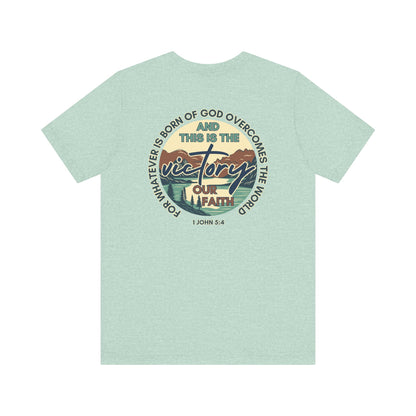 Mint green This Is The Victory T-shirt by Logos with faith and victory graphic design on the back