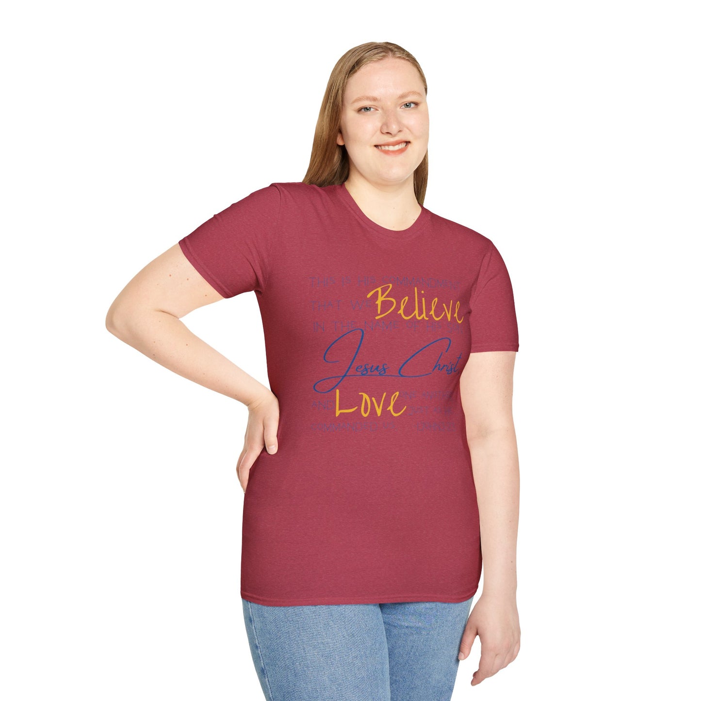 Logos Love One Another shirt in maroon with inspirational text worn by a woman wearing denim jeans