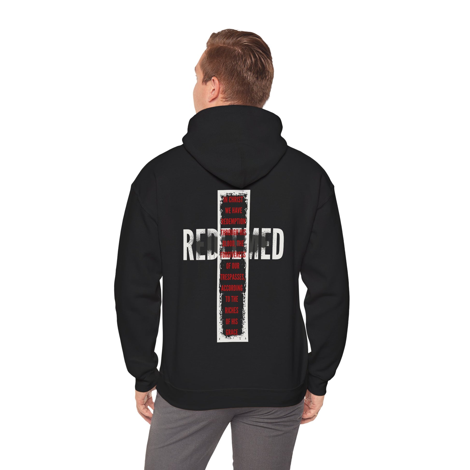 Men's black Redeemed Ephesians 1:7 sweatshirt featuring bold graphic design on the back