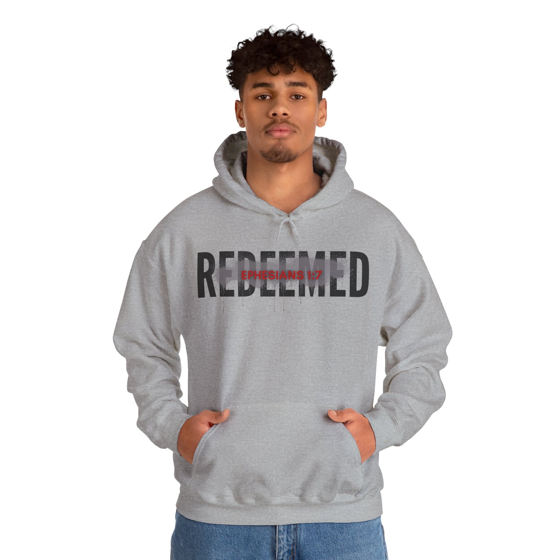 Gray hoodie featuring 'Redeemed Ephesians 1:7 sweatshirt' design with a stylish fit