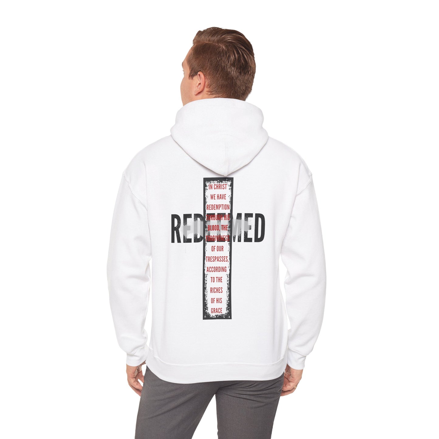 Back view of a white hooded sweatshirt featuring 'Redeemed Ephesians 1:7 sweatshirt' text design for stylish comfort.