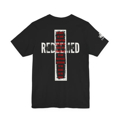 Black Redeemed t-shirt featuring a bold cross design and inspiring text on the back