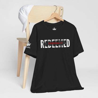 Black Redeemed t-shirt featuring Ephesians 1:7 graphic design on soft fabric