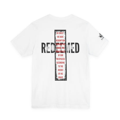Redeemed t-shirt featuring a bold back design with red and black text on a white fabric