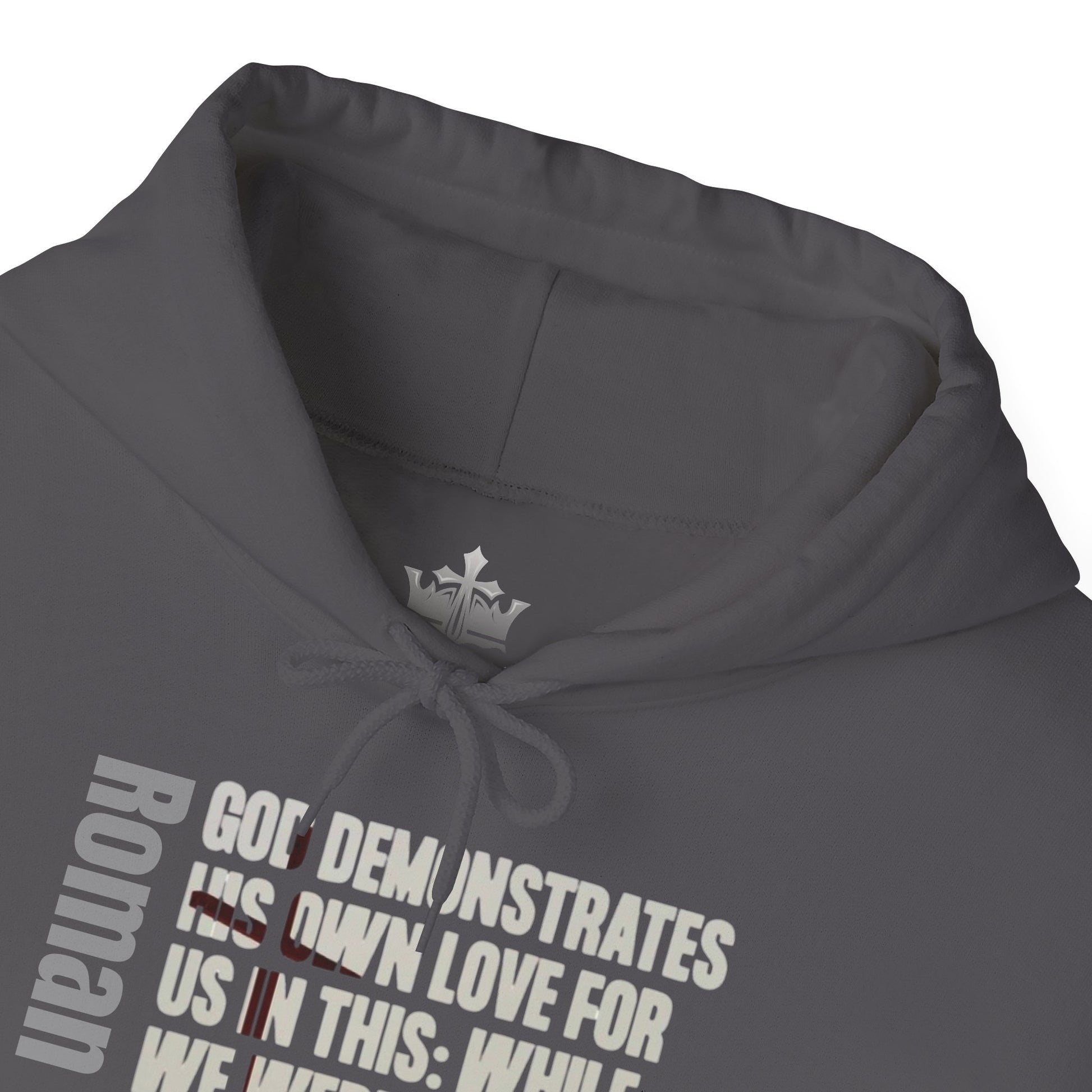 Charcoal Romans 5:8 hoodie from Logos Co. with inspirational Bible verse text and a drawstring hood