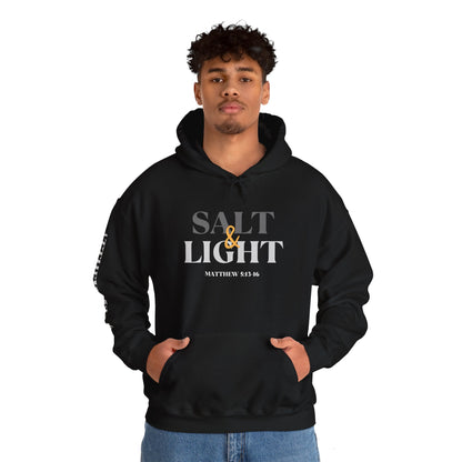 Black Salt and Light scripture hoodie with Matthew 5 13-16 text worn by man