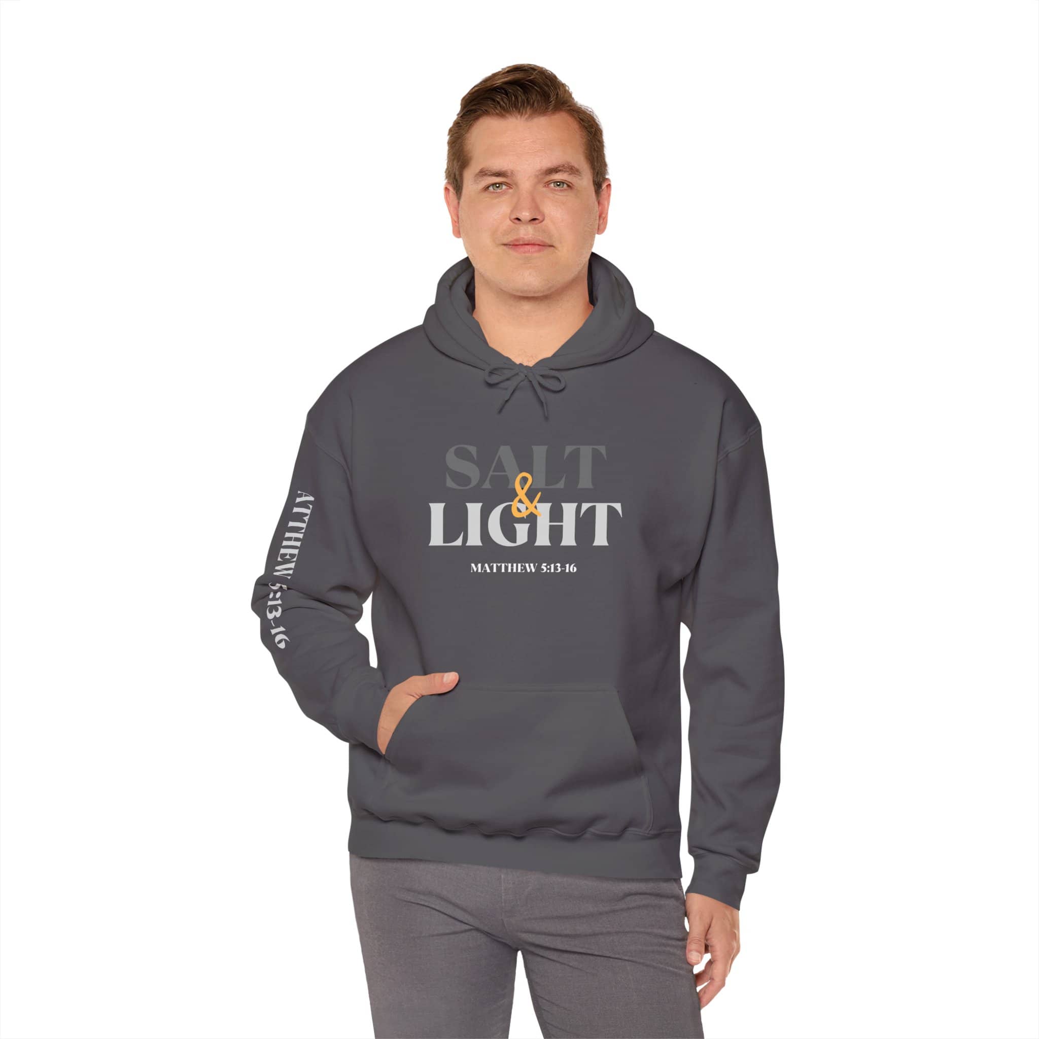 Salt and Light scripture hoodie in charcoal with Matthew 5 13-16 design worn by man