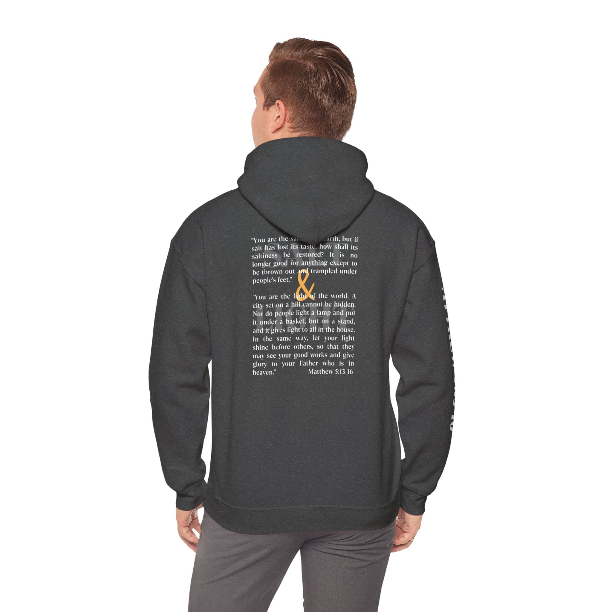 Dark Heather Salt and Light scripture hoodie in dark color featuring biblical text and a design on the back