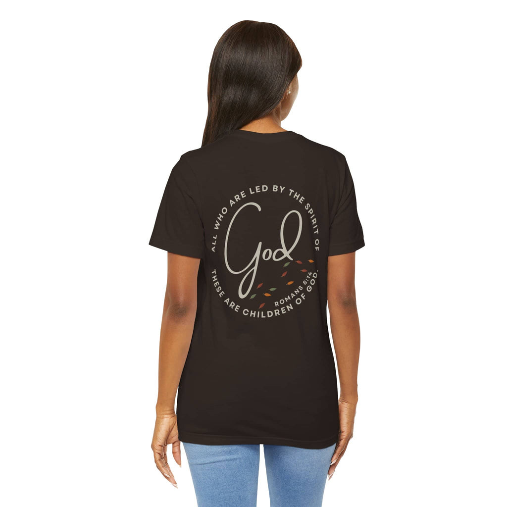Back view of woman wearing a black Spirit Lead Me shirt with God quote design by Logos