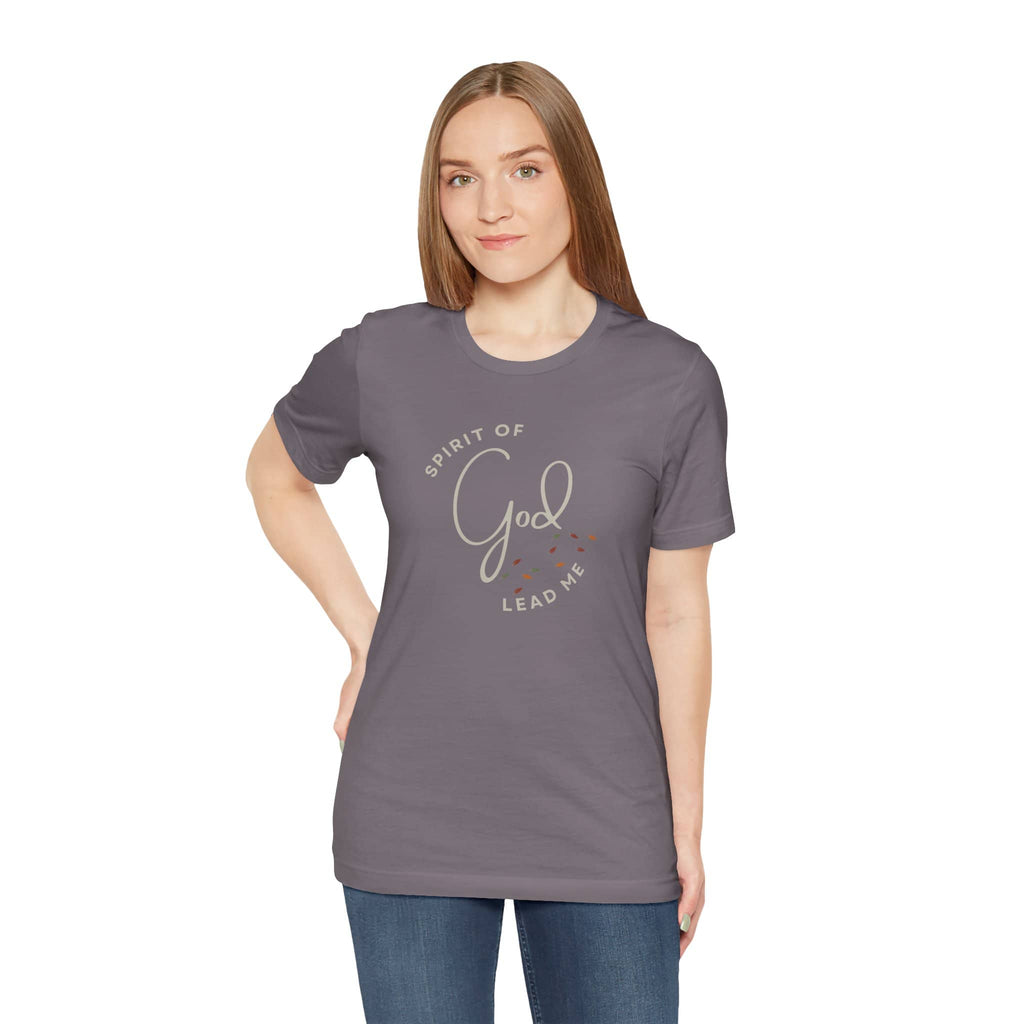 Woman wearing a gray Spirit Lead Me shirt with God-themed text print and casual fit