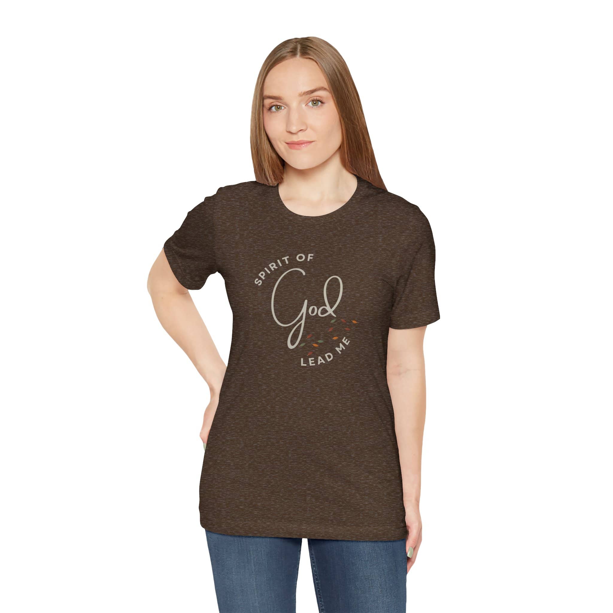 Woman wearing a heather brown Spirit Lead Me shirt with God text design in casual style