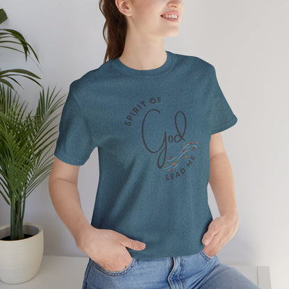 Woman wearing a indigo blue Spirit Lead Me shirt with Romans 8:14 text design from Logos in casual setting
