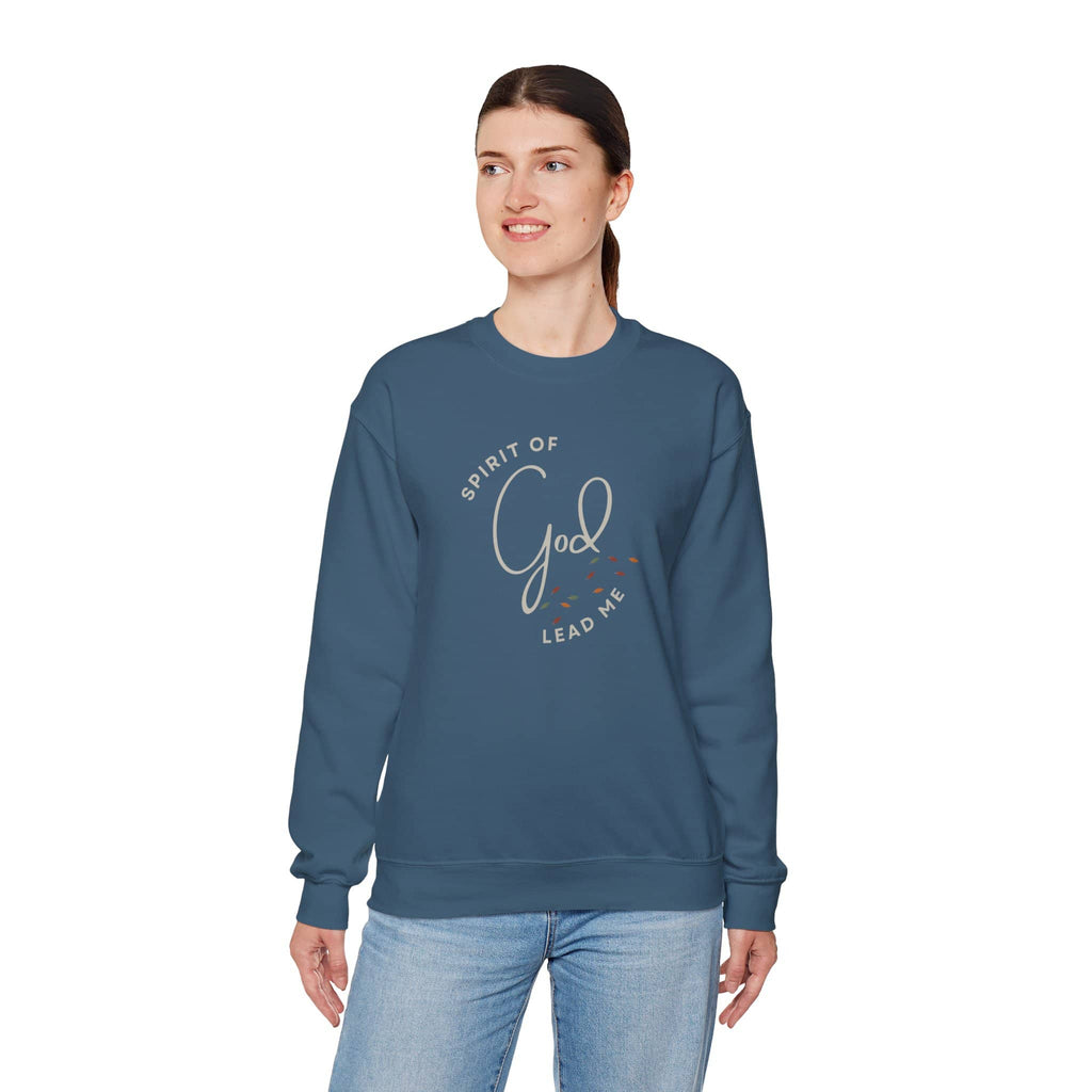Woman wearing a blue Spirit Lead Me sweatshirt with religious text design from Logos 