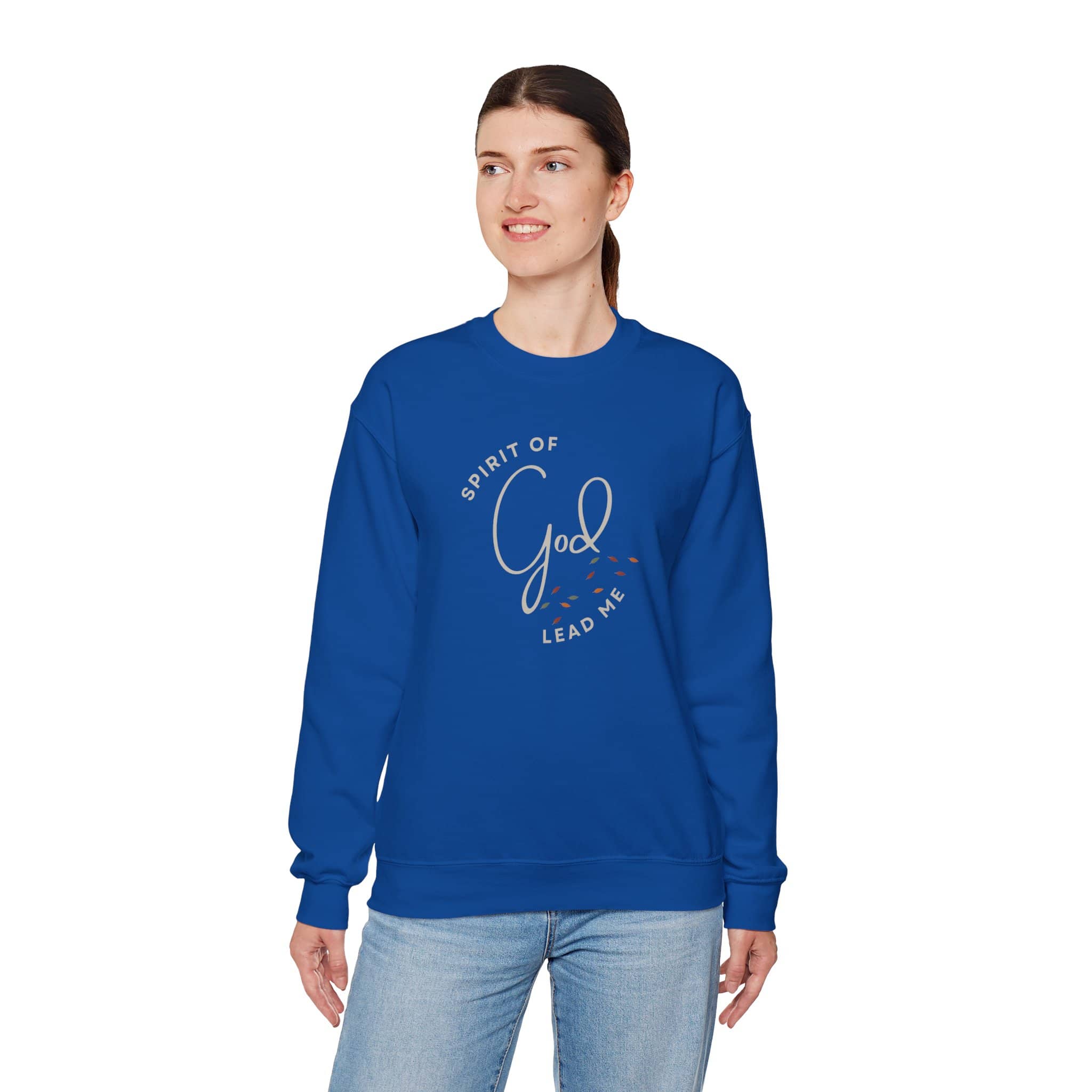 Blue Spirit Lead Me sweatshirt with script God design worn by woman with jeans
