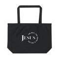 Black canvas tote bag featuring 'The Way, The Truth, The Life Shopper' and 'Jesus' design, front view