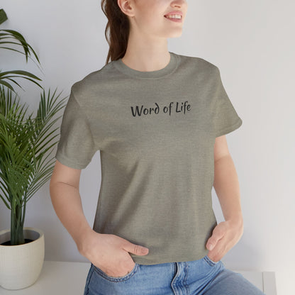 Word of Life Christian shirt on woman in gray t-shirt with casual blue jeans